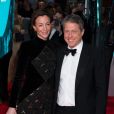 Hugh Grant et sa femme Anna Elisabet Eberstein à la 73e cérémonie des British Academy Film Awards (BAFTA) au Royal Albert Hall à Londres, le 2 février 2020.