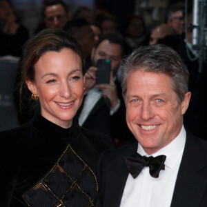 Hugh Grant et sa femme Anna Elisabet Eberstein à la 73e cérémonie des British Academy Film Awards (BAFTA) au Royal Albert Hall à Londres, le 2 février 2020.
