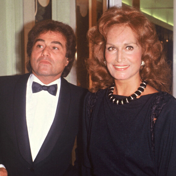 Archives - Orlando et la chanteuse Dalida lors d'une soirée à Paris. 1983.