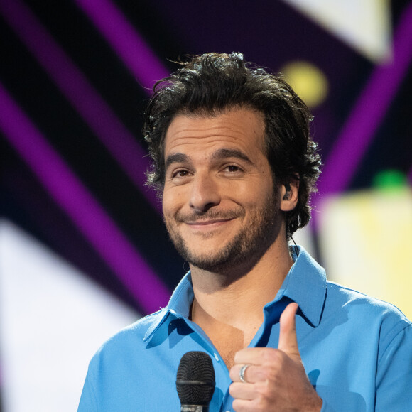 Amir à la 22e édition des NRJ Music Awards, à la Seine musicale, le 5 décembre 2020.