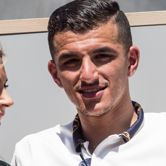 Marion Bartoli et son nouveau compagnon le joueur de football belge Yahya Boumediene dans les tribunes lors des internationaux de tennis de Roland Garros à Paris, France, le 2 juin 2019. © Jacovides-Moreau/Bestimage  Celebs attending the French Tennis Open at Roland Garros in Paris, France, on June 2nd, 2019. 