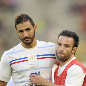 Mathieu Valbuena et Karim Benzema lors du match amical Belgique - France en août 2013.