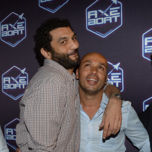 Eric Judor et Ramzy Bedia - Soiree Axe Boat a cote du Palais des Festivals dans le port de Cannes, le 3 aout 2013.