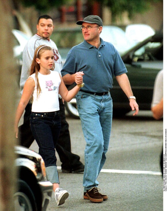 Phil Collins et sa fille Lily font du shopping à Beverly Hills. Los Angeles.