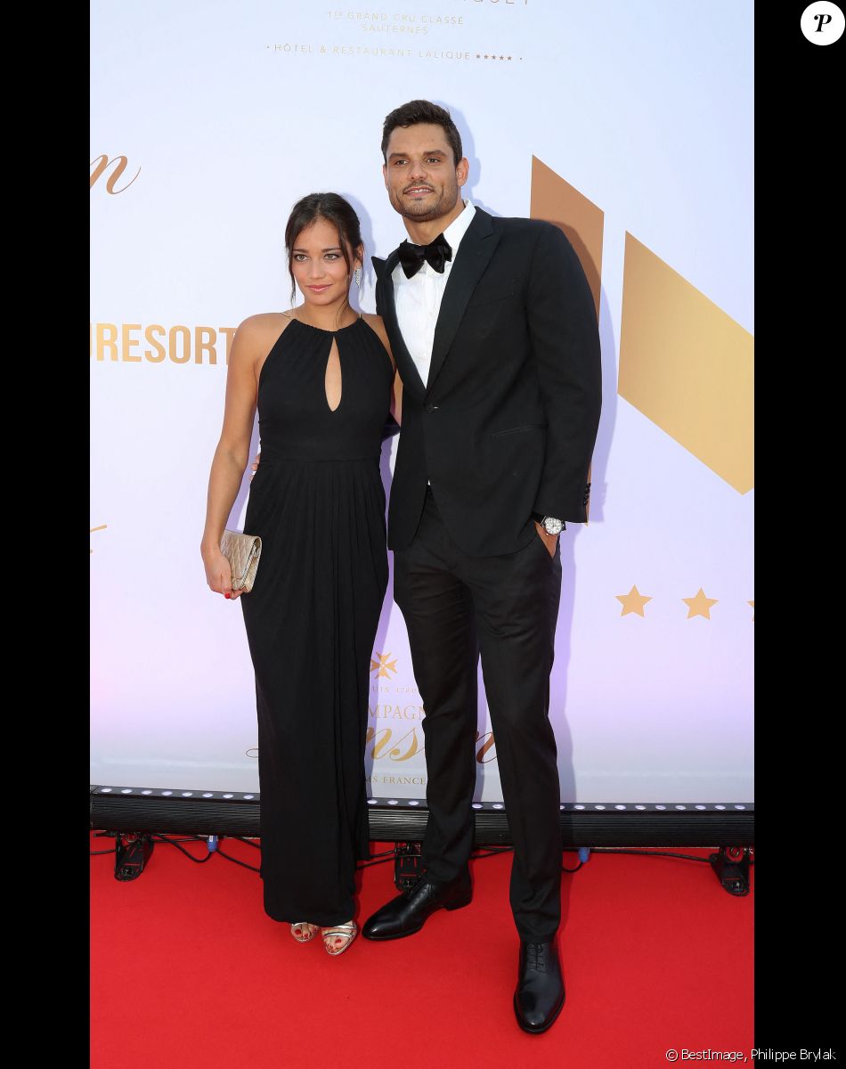 Exclusif - Florent Manaudou et sa compagne Alizé Lim - Gala de charité de l'académie de tennis Mouratoglou afin de récolter des fonds pour sa fondation "Champ'Seed" à Biot le 23 juin 2019. © Philippe Brylak /Bestimage