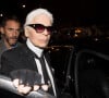 Karl Lagerfeld et son assistant Sébastien Jondeau arrivant à la soirée de Carine Roitfeld à l'hôtel Four Seasons George V à Paris, le 4 mars 2017.