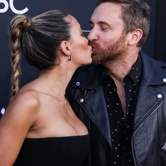 David Guetta et sa compagne Jessica Ledon - People à la soirée des "Billboard Music Awards 2019" au MGM Grand Garden Arena à Las Vegas. Le 1er mai 2019.