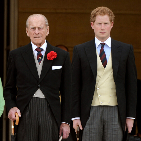 La princesse Anne d'Angleterre, la reine Elizabeth II, Le prince Philip, duc d'Edimbourg et le prince Harry - Garden Party au palais de Buckingham à Londres.