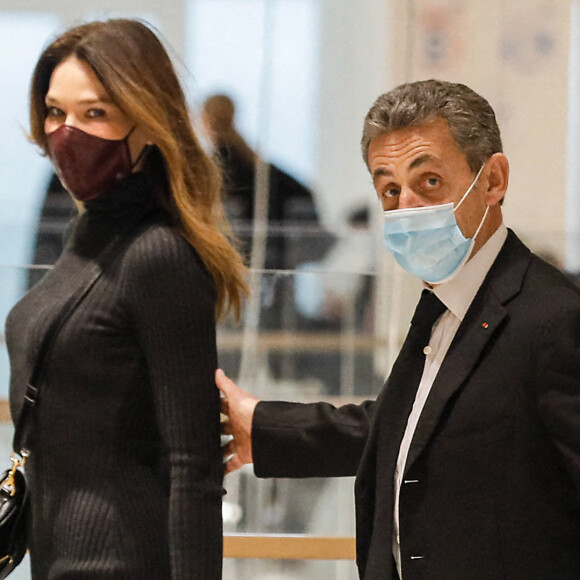 1er jour des plaidoiries de la défense - Nicolas Sarkozy arrive avec sa femme Carla Bruni Sarkozy procès des "écoutes téléphoniques" (affaire Bismuth) au tribunal de Paris le 9 décembre 2020. © Christophe Clovis / Bestimage 