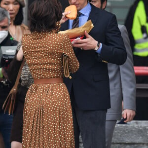 Lady Gaga et Adam Driver tournent une scène du film Gucci (House of Gucci) à Milan, le 11 mars 2021.