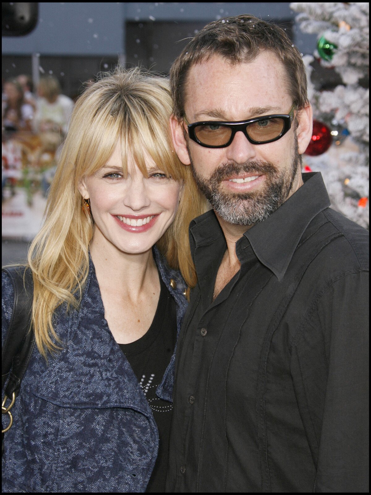 Photo : Kathryn Morris et David Barrett à la première du film Fred Claus. -  Purepeople