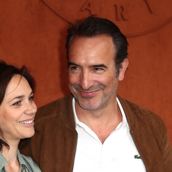 Jean Dujardin et Nathalie Péchalat - Finale hommes lors des internationaux de France de tennis de Roland Garros 2019 à Paris. Le 9 juin 2019. © Jacovides - Moreau / Bestimage
