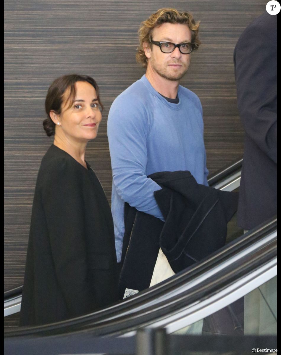 Simon Baker et son ex-femme Rebecca Rigg à l'aéroport de Los Angeles, le 2 février 2015.