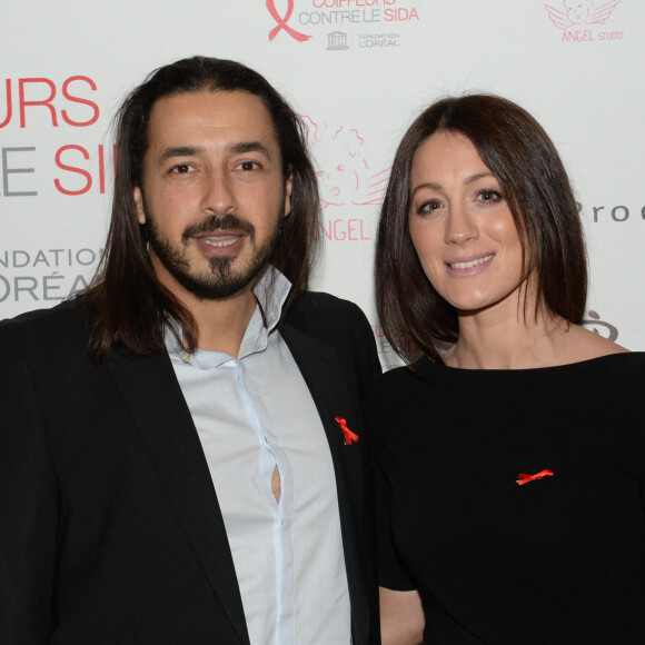 Moundir et sa femme Inès lors de l'opération " Coiffeurs Contre le Sida " édition 2014 à l'Académie L'Oréal Produits Professionnels à Paris
