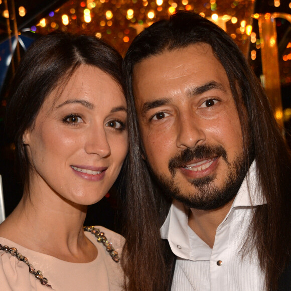 Moundir et sa femme Inès - Personnalités lors de la 10ème cérémonie des Globes de Cristal au Lido à Paris, le 13 avril 2015. 