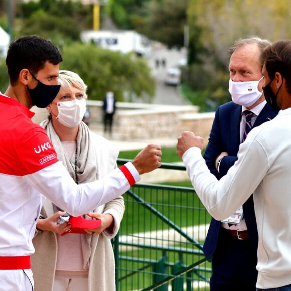 Novak Djokovic et Rafael Nadal (de dos) à Monaco, 11 avril 2021. © Bruno Bebert/Bestimage