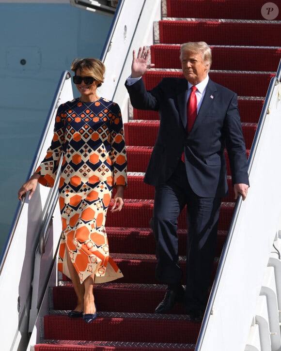 Donald Trump et sa femme Melania débarquent à l'aéroport international de Palm Beach, le 20 janvier 2021.