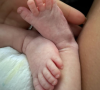 Christina Milian et les pieds de son fils, Kenna. Mai 2021.