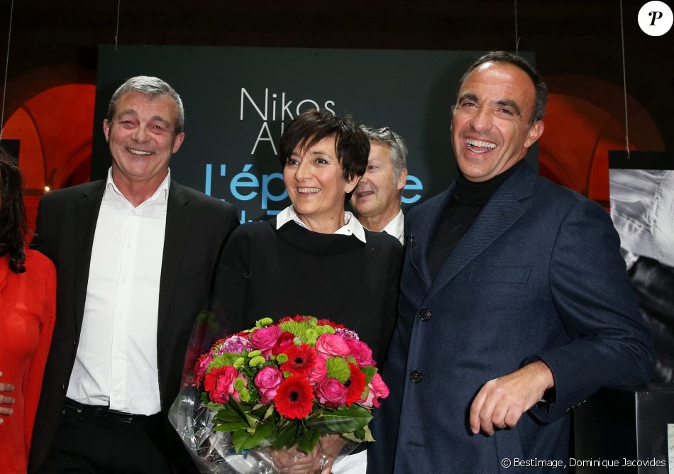 Laurence et Pierre Lemarchal (Parents de Grégory Lemarchal) et Nikos Aliagas - Vernissage de l'exposition "L'épreuve du Temps" de Nikos Aliagas au Palais Brongniart à Paris, le 16 janvier 2017. © Dominique Jacovides/Bestimage
