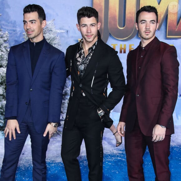 Les Jonas Brothers, Joe Jonas, Nick Jonas et Kevin Jonas à la première de 'Jumanji: The Next Level' au théâtre Chinese dans le quartier d'Hollywood à Los Angeles, le 9 décembre 2019.