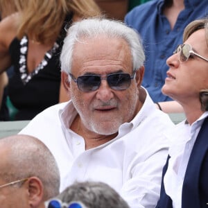 Dominique Strauss-Kahn (DSK) et sa femme Myriam L'Aouffir dans les tribunes de Roland-Garros à Paris. Le 30 mai 2017 