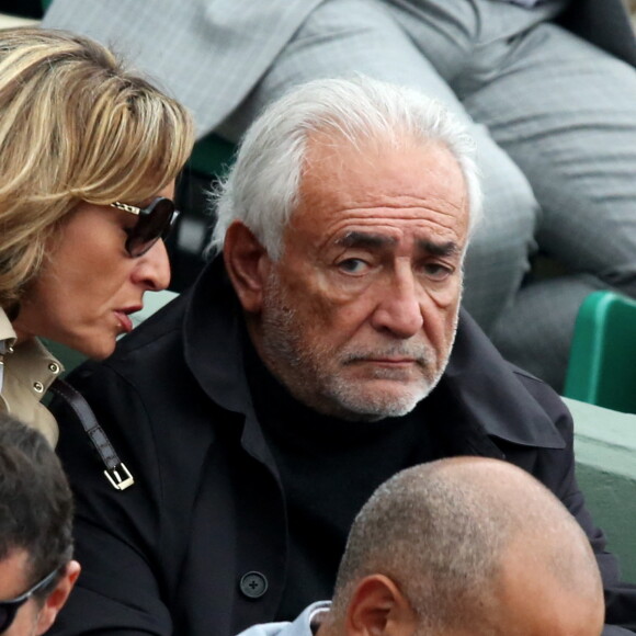 Dominique Strauss Kahn (DSK) et Myriam L'Aouffir dans les tribunes de la finale homme des internationaux de France de Roland Garros à Paris le 5 juin 2016. © Moreau-Jacovides / Bestimage 