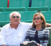 Dominique Strauss Kahn et Myriam L'Aouffir dans les tribunes des Internationaux de France de tennis de Roland Garros le 30 mai 2015. 