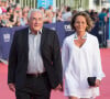 Dominique Strauss-Kahn et Myriam L'Aouffir - Avant-première du film "Sin City" lors du 40ème festival du cinéma américain de Deauville, le 13 septembre 2014. 