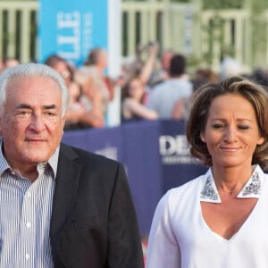 Dominique Strauss-Kahn et Myriam L'Aouffir - Avant-première du film "Sin City" lors du 40ème festival du cinéma américain de Deauville, le 13 septembre 2014. 