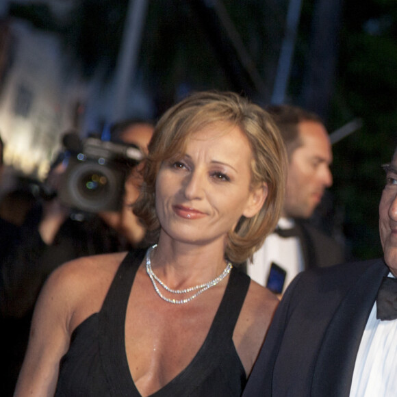 Dominique Strauss Kahn et sa compagne Myriam L'Aouffir sur le tapis rouge lors du 66eme festival du film de Cannes. Le 25 mai 2013 