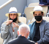 Carla Ginola et son compagnon Adrien Rosenpick dans les tribunes des Internationaux de France de tennis de Roland Garros, à Paris. © Dominique Jacovides/Bestimage