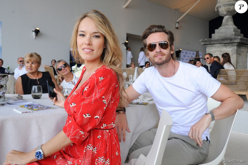 Philippe Lacheau et sa compagne Elodie Fontan - Longines Paris Eiffel Jumping au Champ de Mars à Paris, le 7 juillet 2019.