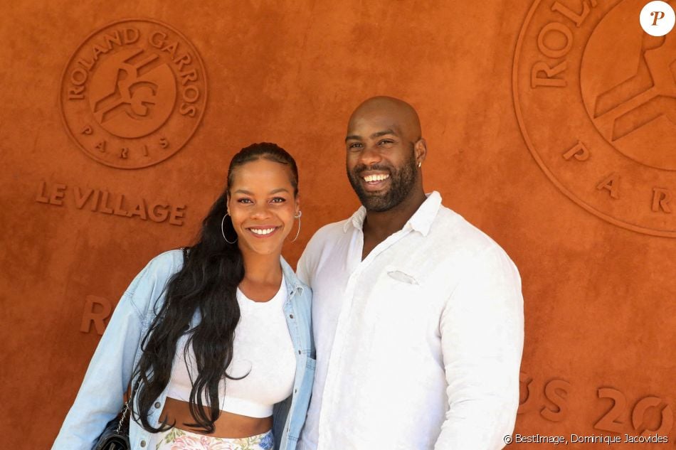 Teddy Riner et sa femme Luthna Plocus ont assisté à la finale simple messieurs de Roland-Garros opposant Novak Djokovic à Stefanos Tsitsipas. © Dominique Jacovides / Bestimage