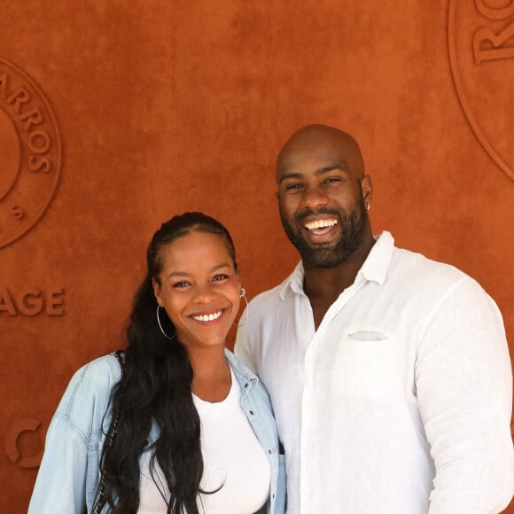 Teddy Riner et sa femme Luthna Plocus au village de Roland-Garros avant la finale opposant Novak Djokovic à Stefanos Tsitsipas. Paris, le 13 juin 2021. © Dominique Jacovides / Bestimage