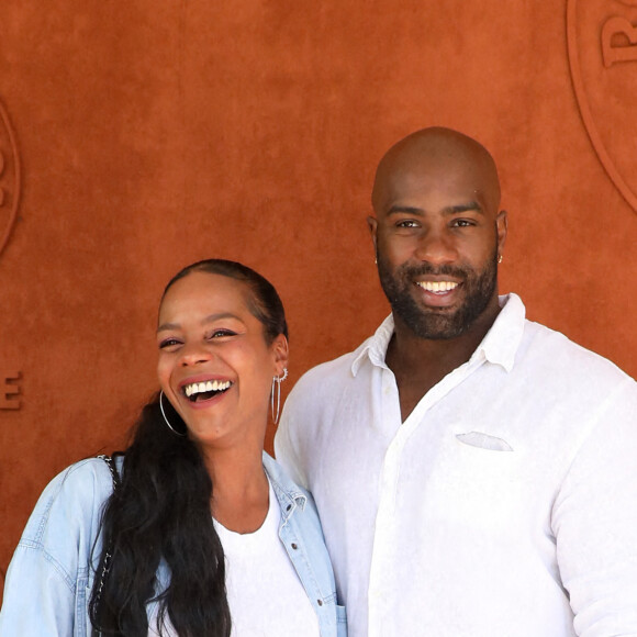 Teddy Riner et sa femme Luthna Plocus au village de Roland-Garros avant la finale opposant Novak Djokovic à Stefanos Tsitsipas. Paris, le 13 juin 2021. © Dominique Jacovides / Bestimage