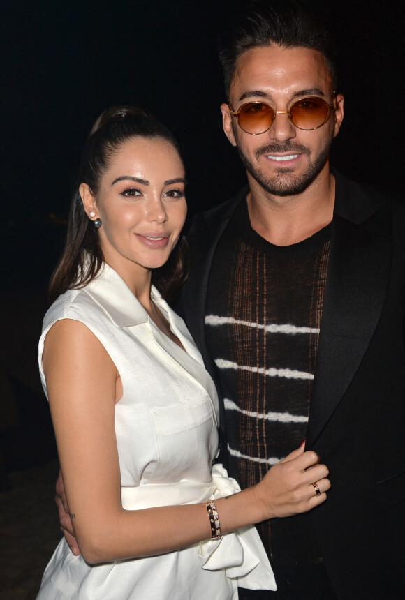 Nabilla Benattia (enceinte) et son mari Thomas Vergara au photocall de l'after party "Magnum x Rita Ora" sur la plage privée Magnum lors du 72ème Festival International du Film de Cannes, France,le 16 mai 2019. © Veeren/Bestimage