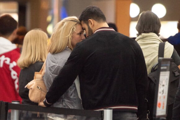 Exclusif - Britney Spears et son compagnon Sam Asghari arrivent à l'aéroport de New York (JFK) le 13 mai 2018.