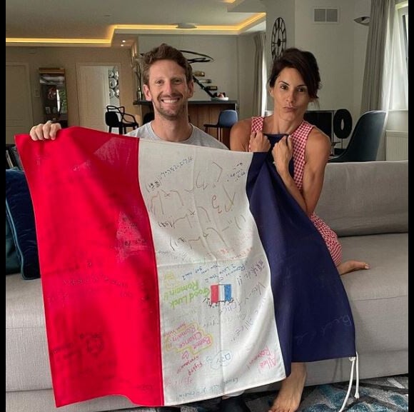 Romain Grosjean et son épouse Marion Jolles Grosjean avant le match France - Suisse, en 8e de finale de l'Euro 2020. Le 28 juin 2021.