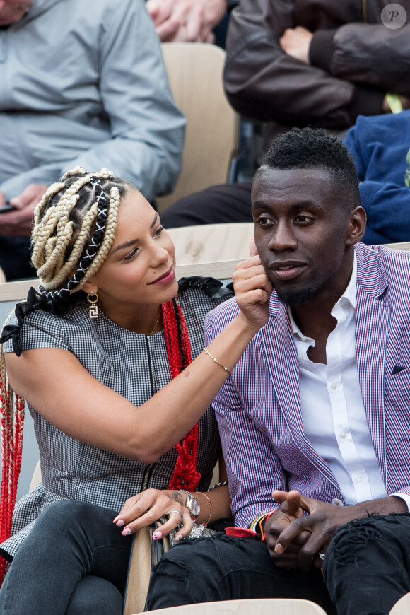 Blaise Matuidi et sa femme Isabelle dans les tribunes lors des internationaux de France de tennis de Roland Garros 2019 à Paris le 28 mai 2019.
