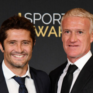 Bixente Lizarazu et Didier Deschamps, sélectionneur et ancien joueur de l'équipe de France de football, durant la soirée des Sportel Awards 2018 au Grimaldi Forum à Monaco le 23 octobre 2018. Les Sportel Awards sont une compétition internationale visant à récompenser les plus belles images de sport de l'année dans le cadre du Sportel qui est un salon international du sport et des médias qui se déroule sur 3 jours en Principauté. © Bruno Bebert/Bestimage