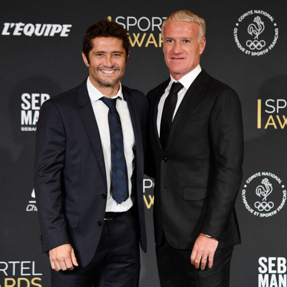 Bixente Lizarazu et Didier Deschamps, sélectionneur et ancien joueur de l'équipe de France de football, durant la soirée des Sportel Awards 2018 au Grimaldi Forum à Monaco le 23 octobre 2018. Les Sportel Awards sont une compétition internationale visant à récompenser les plus belles images de sport de l'année dans le cadre du Sportel qui est un salon international du sport et des médias qui se déroule sur 3 jours en Principauté. © Bruno Bebert/Bestimage