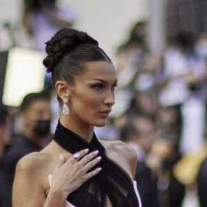 Bella Hadid, vêtue d'une robe Jean Paul Gaultier (collection Haute Couture printemps-été 2002), monte les marches du Palais des Festivals pour la cérémonie d'ouverture du 74ème Festival International du Film de Cannes. Le 6 juillet 2021 © Borde-Jacovides-Moreau / Bestimage