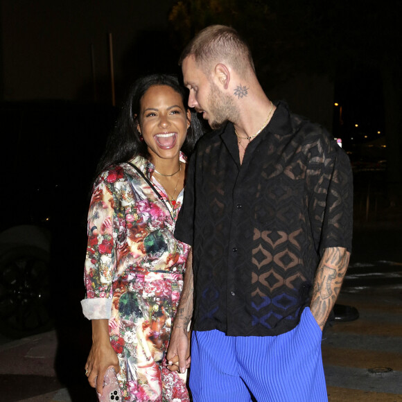 M. Pokora et Christina Milian quittent le VIP Room (et le restaurant La Gioia) à Saint-Tropez, dans la nuit du 9 au 10 juillet 2021.