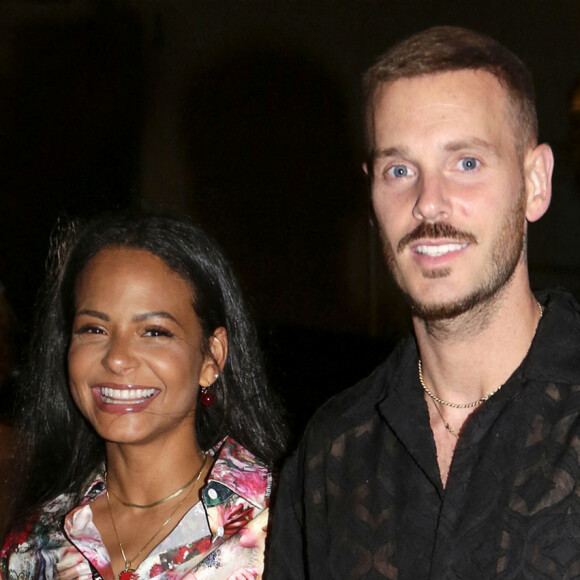 M. Pokora et Christina Milian quittent le VIP Room (et le restaurant La Gioia) à Saint-Tropez, dans la nuit du 9 au 10 juillet 2021.