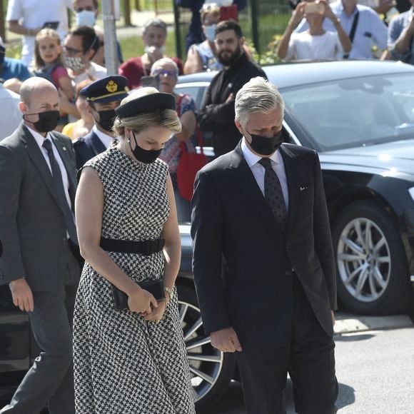 Le roi Philippe et la reine Mathilde de Belgique rendent hommage aux victimes des inondations à Verviers, lors de la journée de de deuil national en Belgique.