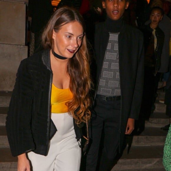 Le chanteur Stromae et sa femme Coralie Barbier - Défilé de mode "Kenzo" collection prêt-à-porter Printemps-Eté 2017 lors de la Fashion Week de Paris à la Cité de l'architecture et du patrimoine au Trocadéro à Paris, France, le 4 octobre 2016. © Agence/Bestimage