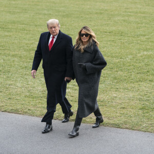 Le président Donald Trump et sa femme Melania arrivent à la Maison Blanche après leur séjour en Floride. Le 31 décembre 2020.