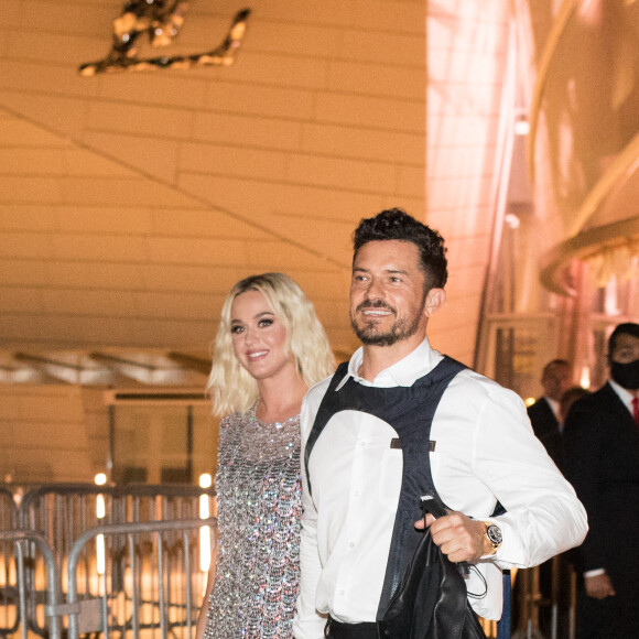 Exclusif - Katy Perry et son fiancé Olrando Bloom - Les célébrités à la sortie de la soirée Louis Vuitton organisée à la Fondation Louis Vuitton à Paris pour le lancement de la nouvelle collection de parfums "Les Extraits", le 5 juillet 2021. © Tiziano Da Silva / Panoramic / Bestimage