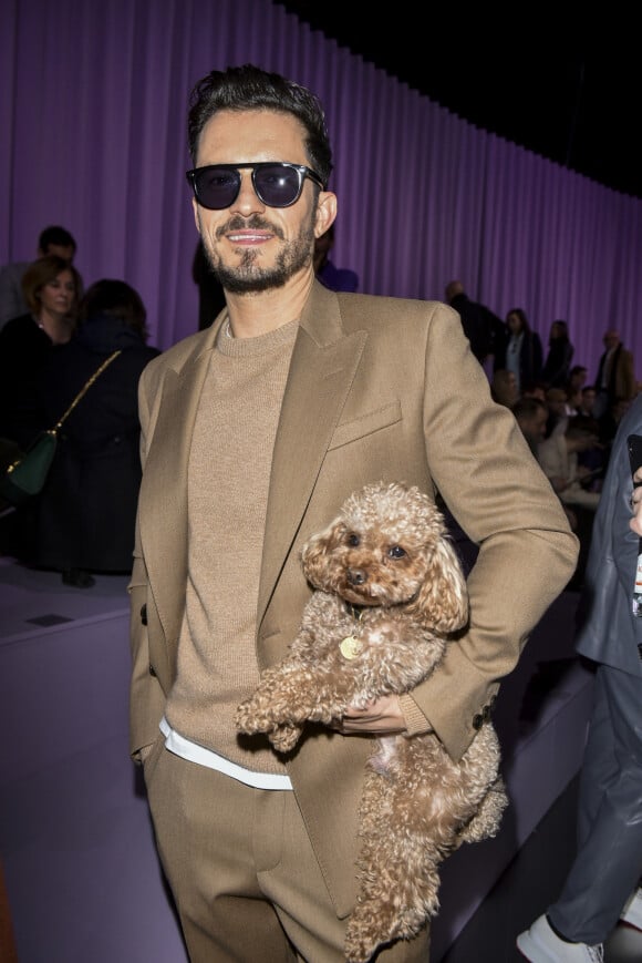 Orlando Bloom (avec son chien Mighty) - People au défilé de mode "Boss" collection Automne-Hiver 2020-2021 lors de la fashion week à Milan, le 23 février 2020.