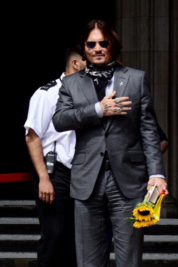 Johnny Depp à son arrivée à la cour royale de justice à Londres, pour le procès en diffamation contre le magazine "The Sun" à Londres.